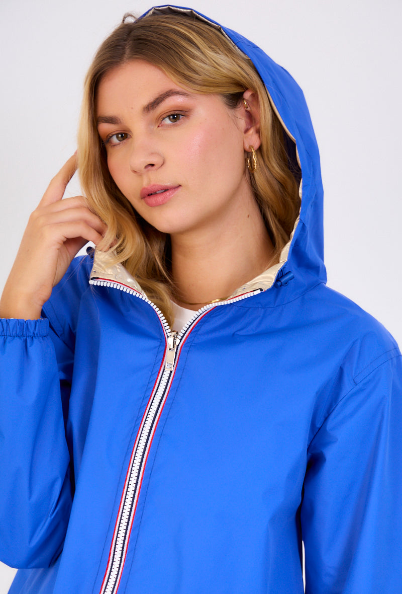 Parka mi-longue réversible bleu/or zip blanc