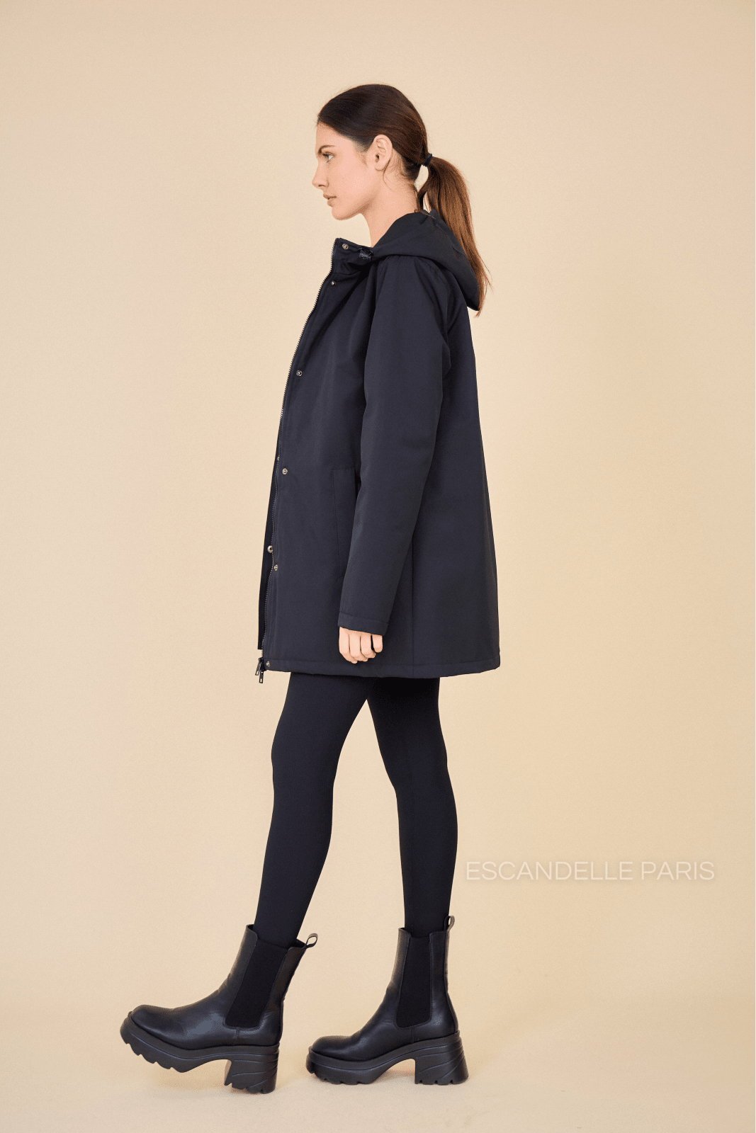 INES parka mi-long matelassée imperméable noir femme - Escandelle Paris (silhouette de profil)
#couleur_noir