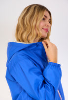 Parka courte à capuche et poches, réversible Bleu/Or zip blanc.