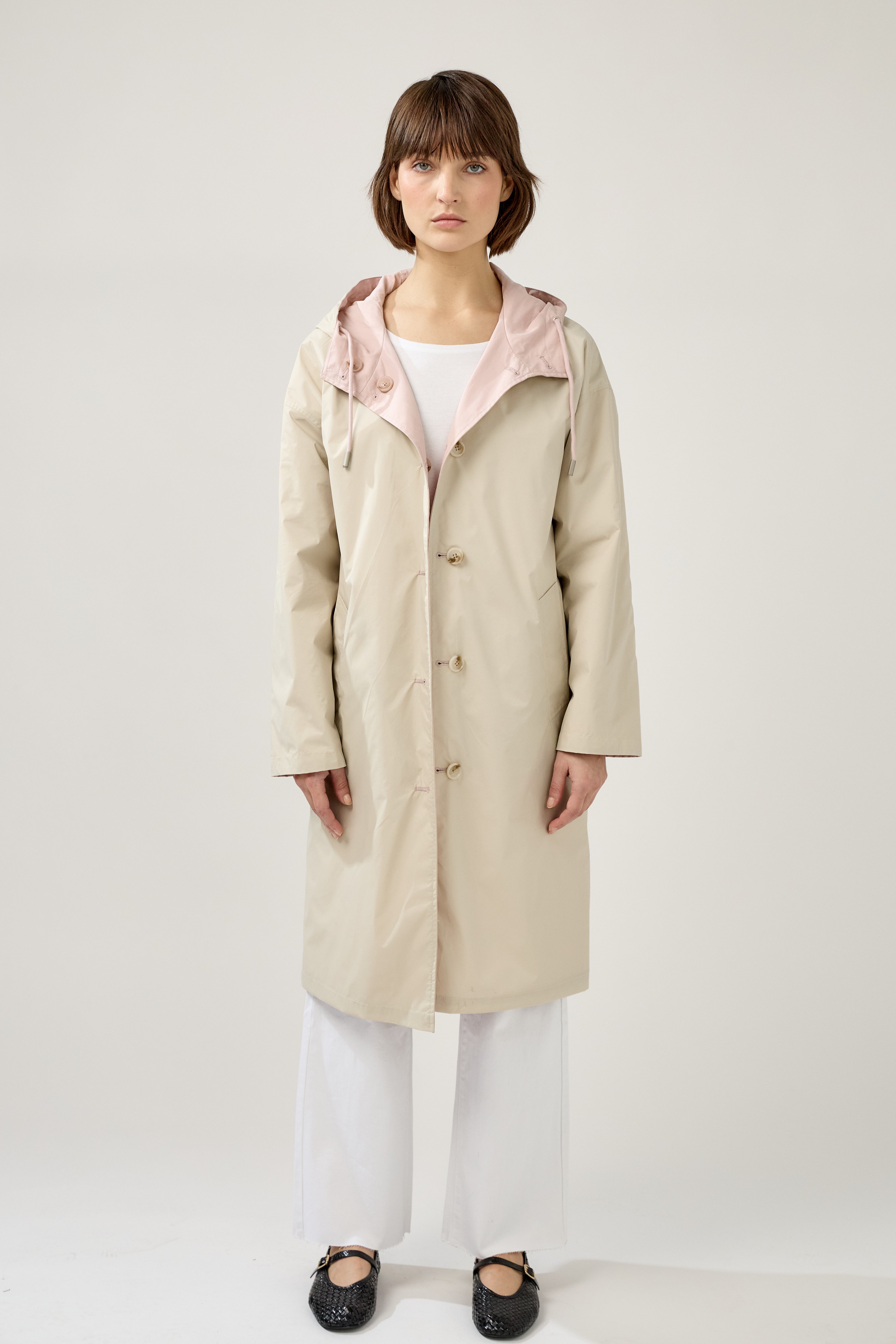 Veste longue réversible et imperméable, capuche à cordon et fermeture à boutons, poches raglans, matière déperlante, mi-saison, devant
#couleur_rose