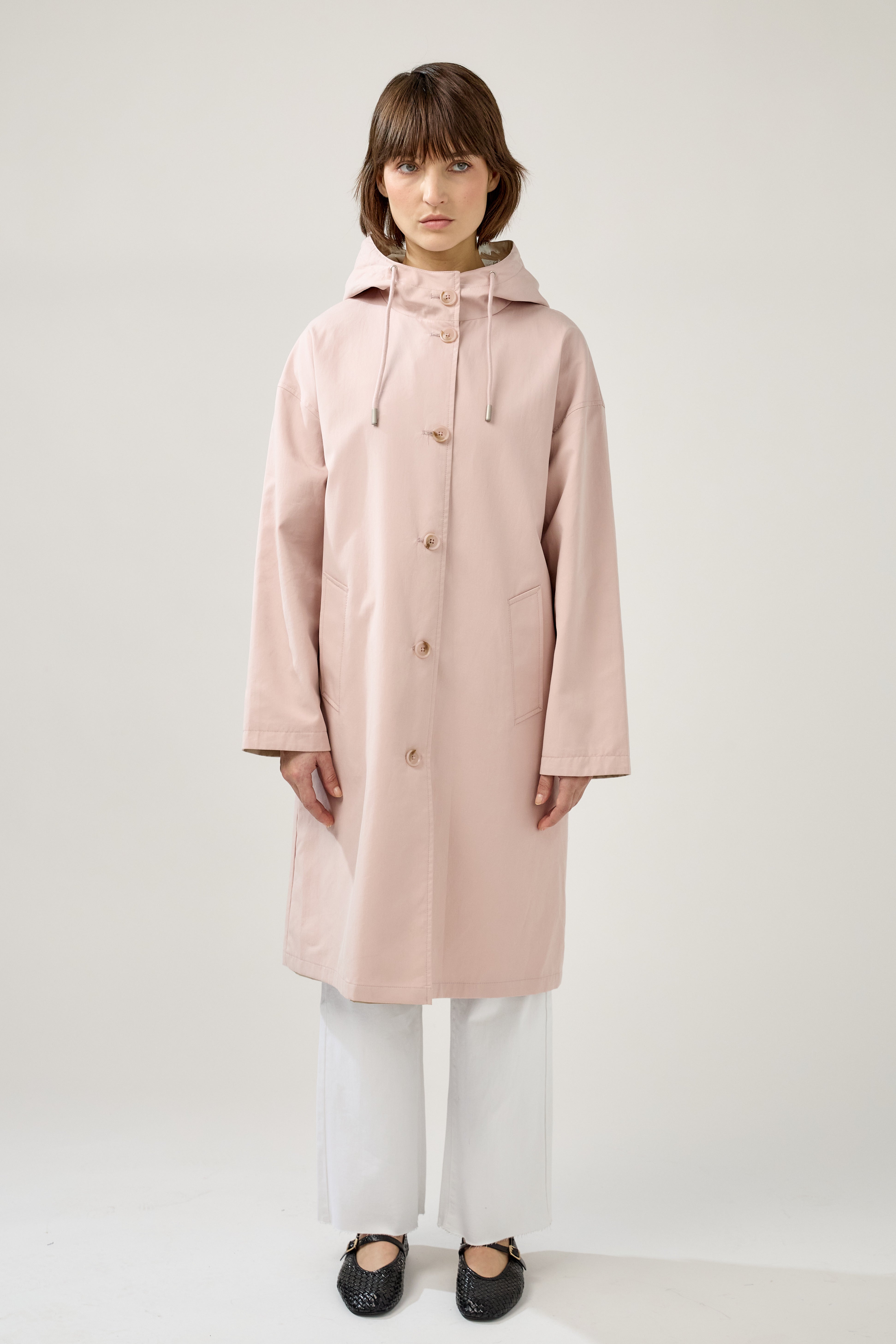 Veste longue réversible et imperméable, capuche à cordon et fermeture à boutons, poches raglans, matière déperlante, mi-saison, devant
#couleur_rose