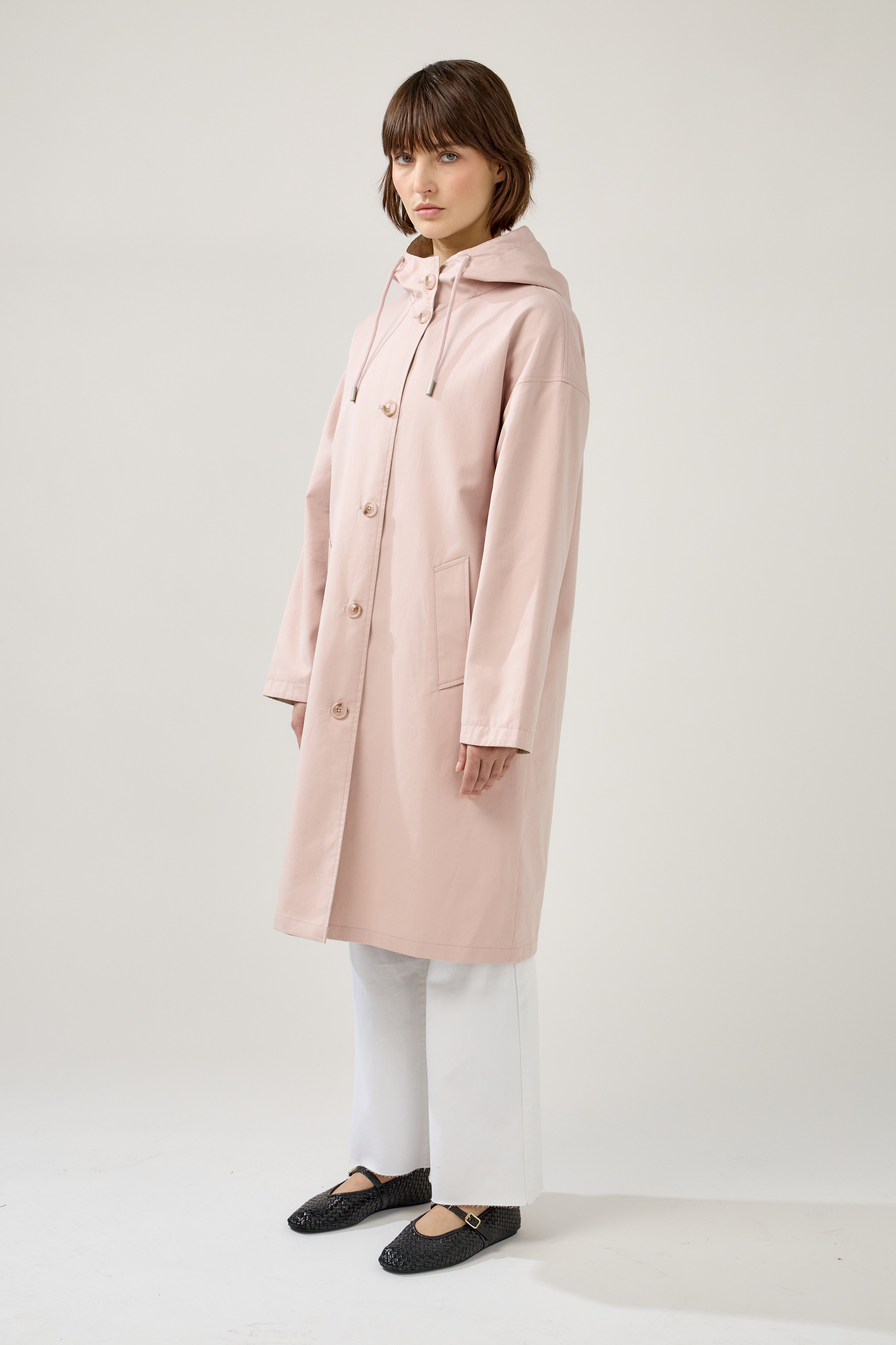 Veste longue réversible et imperméable, capuche à cordon et fermeture à boutons, poches raglans, matière déperlante, mi-saison, côté
#couleur_rose